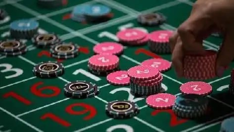 Live blackjack dealer table at Okada Casino viewed on a Philippine player's device